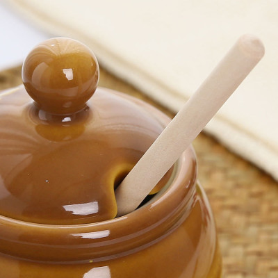 Sweet Nostalgia: Vintage Honey Jar with Wooden Dipper