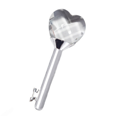 The Key to Your Heart: A Silver Metal Key with a Crystal Heart