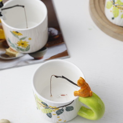 Whiskers and Whimsy: Hand-Painted Porcelain Coffee Mug with Playful Cat and Enchanting Floral Delights