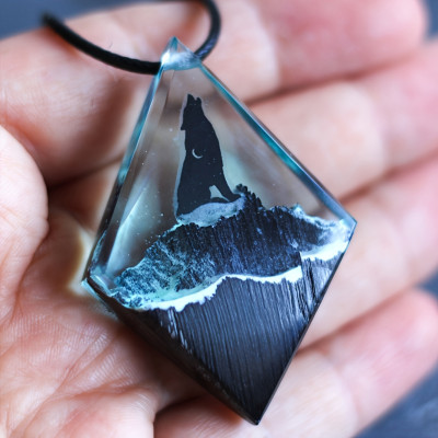 Handmade Wolf Pendant with Majestic Snow Mountain Scene - Captivating Nature Art